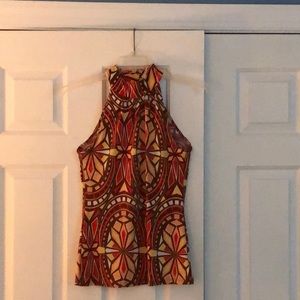 Contemporary, cut away sleeveless halter like top